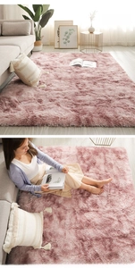 Detail of plush pink-purple shaggy rug showing soft texture in a modern living room