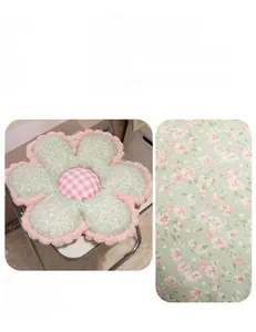 Detail of floral petal seat cushion showing soft milk fleece texture and plush edges