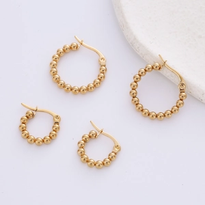 Elegant gold beaded hoop earrings in two sizes with a minimalist polished metal finish