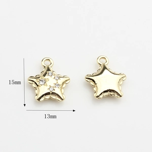 Detailed view of gold star charms with cubic zirconia inlay and 15mm size dimensions