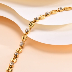 Detail of 18K gold-plated coffee bean links and sparkling zircon stones on this bracelet