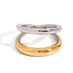 Minimalist silver and gold interlocking stainless steel ring with a polished finish