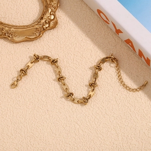 Detail of 14K gold plated coffee bean chain anklet with lobster clasp and extender