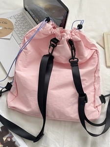 Pink lightweight drawstring backpack in water-resistant nylon for outdoor travel