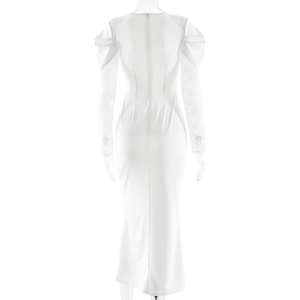 Detailed back view of white V-neck dress featuring delicate lace sleeves and slit hem