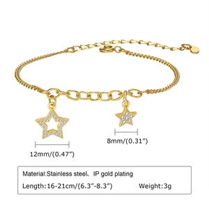 Detail of 18K gold plated stainless steel star bracelet with sparkling zircon stones