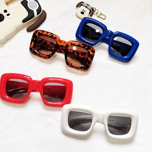 Set of four retro thick square frame kids sunglasses in leopard, blue, red, and white