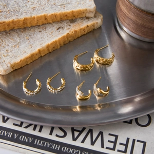 Classic 18K gold-plated stainless steel C-shaped hoop earrings with textured hammered finish