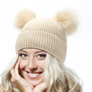 Winter knitted beanie with double faux fur pom poms and thick fleece lining for women