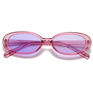 Close-up of pink transparent oval sunglasses with purple lenses and retro Y2K design