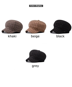 Flat lay of plaid newsboy hats in khaki, beige, black, and grey with grid pattern texture