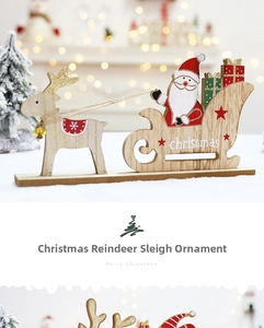 Detail view of handcrafted wooden Santa sleigh with reindeer for Christmas table decor