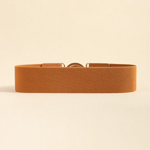 Flat lay of a brown elastic wide cinch belt with high-quality faux leather buckle detail