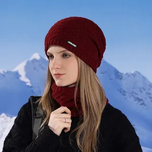 Burgundy winter knit beanie and neck warmer set for men and women in outdoor snow settings