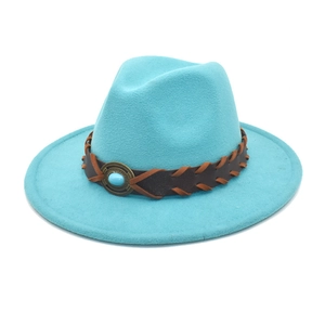 Close-up of woven leather band with turquoise stone on turquoise wool fedora hat