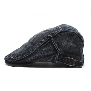 Classic black washed denim flat cap with adjustable bronze buckle and contrast stitching