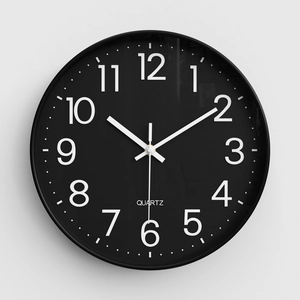 Modern minimalist black wall clock with white numerals and silent quartz movement