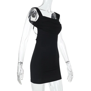 Side view of a sexy black bodycon mini dress featuring ruched bust and slim fit design