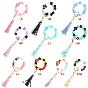 Silicone bead cross keychain wristlet with tassels and Easter rabbit charms in various colors