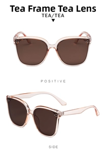 Close-up of square oversized tea-colored sunglasses with metallic rivet detail
