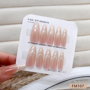 Almond shaped nude cat eye press-on nails with elegant white French tips for women