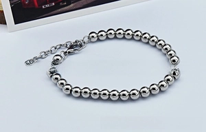 Polished stainless steel beaded bracelet with adjustable lobster clasp and extension chain