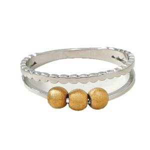 Double-layer stainless steel ring with silver wavy band and three matte gold movable beads