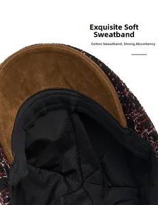 Detail of tweed newsboy cap showing soft cotton sweatband and brown suede brim
