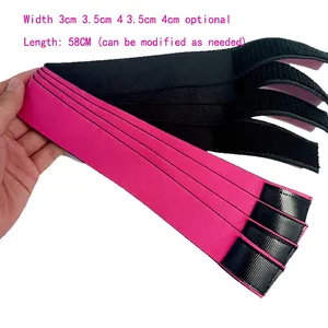Detail showing elastic wig bands in pink and black with velcro closure and three widths