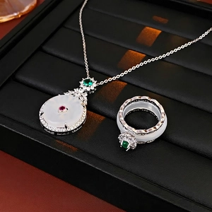 Zircon round jade pendant necklace and ring set with red and green gemstone accents