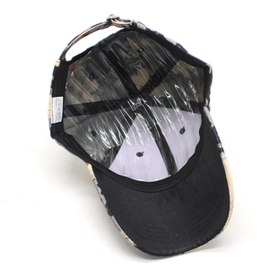 Detail view of the floral baseball cap interior showing the sweatband and adjustable buckle