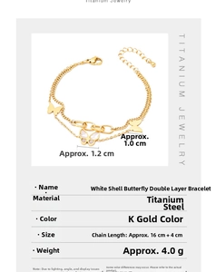Detail view of 18k gold plated double layer titanium bracelet with shell butterfly charms