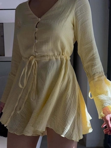 Yellow long sleeve A-line dress with V-neck, waist drawstring and textured fabric