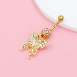 Macro detail of golden butterfly belly ring with sparkling pink gemstones and hollow design