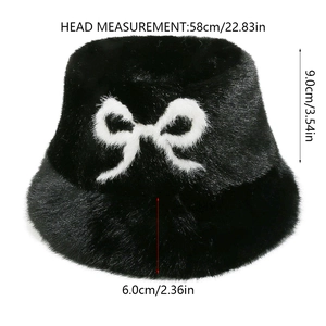 Detail view of black plush bucket hat with white bow including dimensions 58cm size