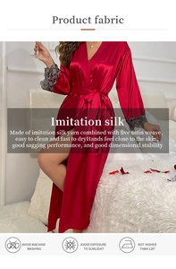 Detail of red imitation silk robe with elegant lace cuffs and soft satin texture
