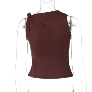 Detail of dark brown sleeveless slim top with a stylish knot and diagonal shoulder cut