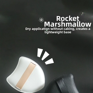 Detail of rocket-shaped triangular makeup puffs showing stitching and pointed tip