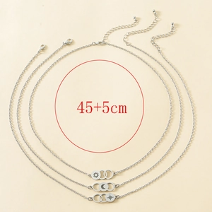 Detailed view of 3pcs silver sun moon star necklaces with 45+5cm length measurement