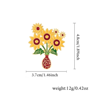 Detail view of sunflower brooch with measurements: 4.8cm height and 3.7cm width