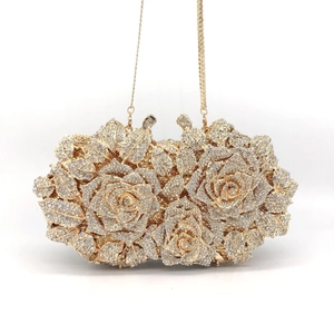 Luxury gold rose-shaped evening clutch bag with sparkling rhinestones and chain strap