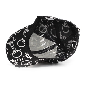 Detail view of the interior seams, breathable fabric and printed lining of the baseball cap