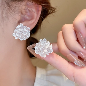 Elegant white floral earrings for women with layered petals and soft matte finish