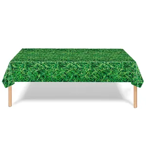 Detail view of rectangular Super Bowl party tablecloth with realistic green grass field print