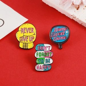 Lot de 3 broches émaillées avec gants de boxe et citations motivantes sur fond rouge vif