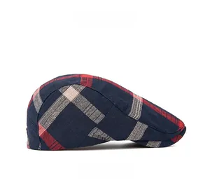Side view of British style navy blue plaid ivy cap showing fabric texture and pattern