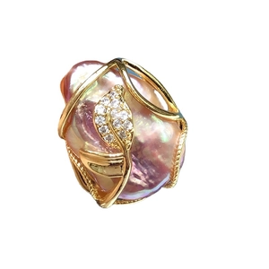 Baroque natural freshwater pearl ring with gold leaf setting and pavé zircon accents