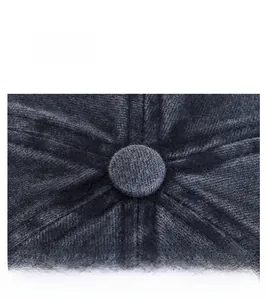 Detailed top view of a washed navy baseball cap featuring stitched panels and button