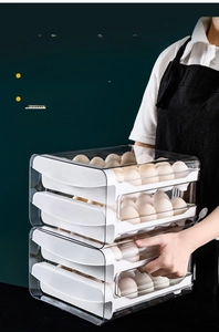 Dual-layer transparent egg storage box with U-shaped handles for easy carrying and drawer access