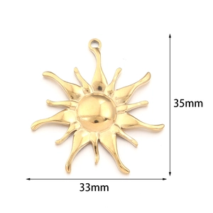 Detailed view of golden sun-shaped stainless steel pendant with 33mm x 35mm dimensions